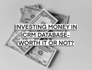 image of a note reading Investing Money In CRM Database – Worth It Or Not? with US Dollar banknotes in the background