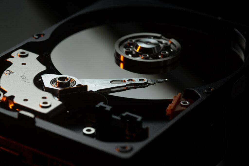 image of the inside of a computer hard disc for the article The Ultimate Beginners Guide To CRM Databases