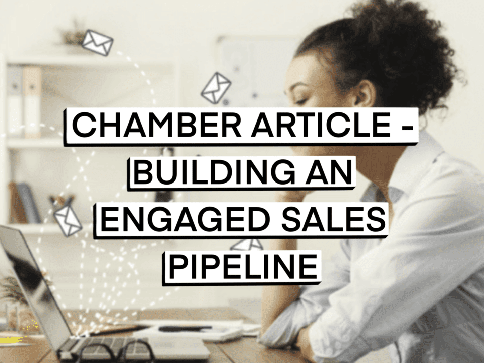 image of a note reading Chamber Article - Building an Engaged Sales Pipeline with a blurred background of a person sitting in front of a computer with mail icons flying