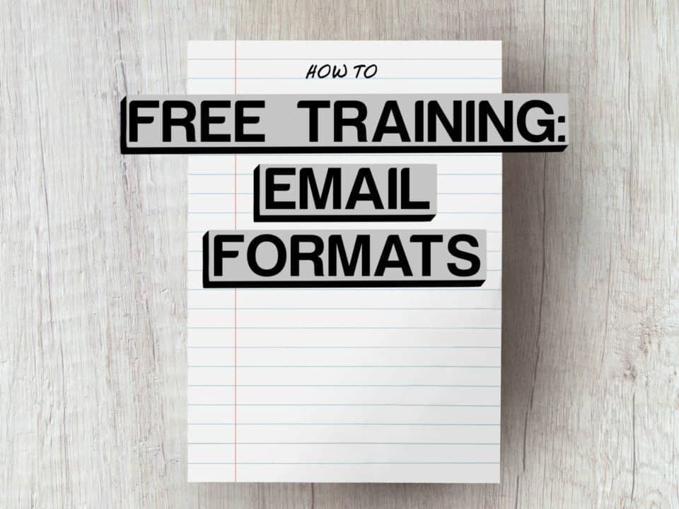 white piece of paper on grey wooden table with the word free training - email formats edited on top