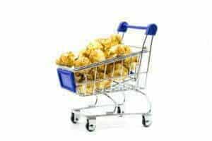 shopping cart full of popcorn image for Customer retention PRM article