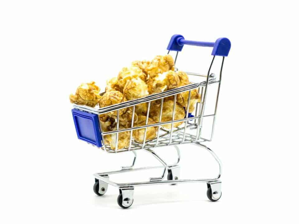 shopping cart full of popcorn image for Customer retention PRM article