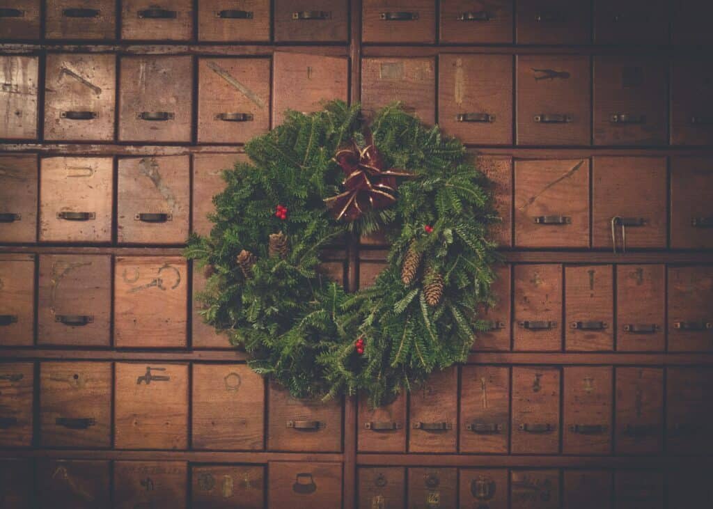 christmas wreath in front of post boxes for christmas marketing article