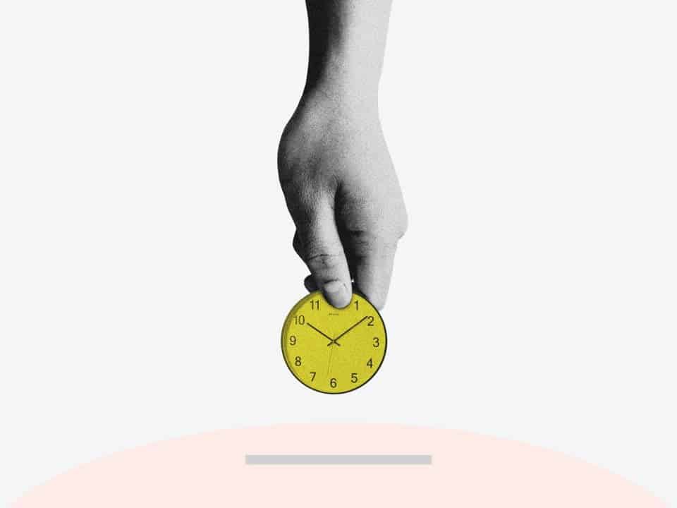 hand putting analogue yellow clock into pink piggy bank for investing time in lead management software article