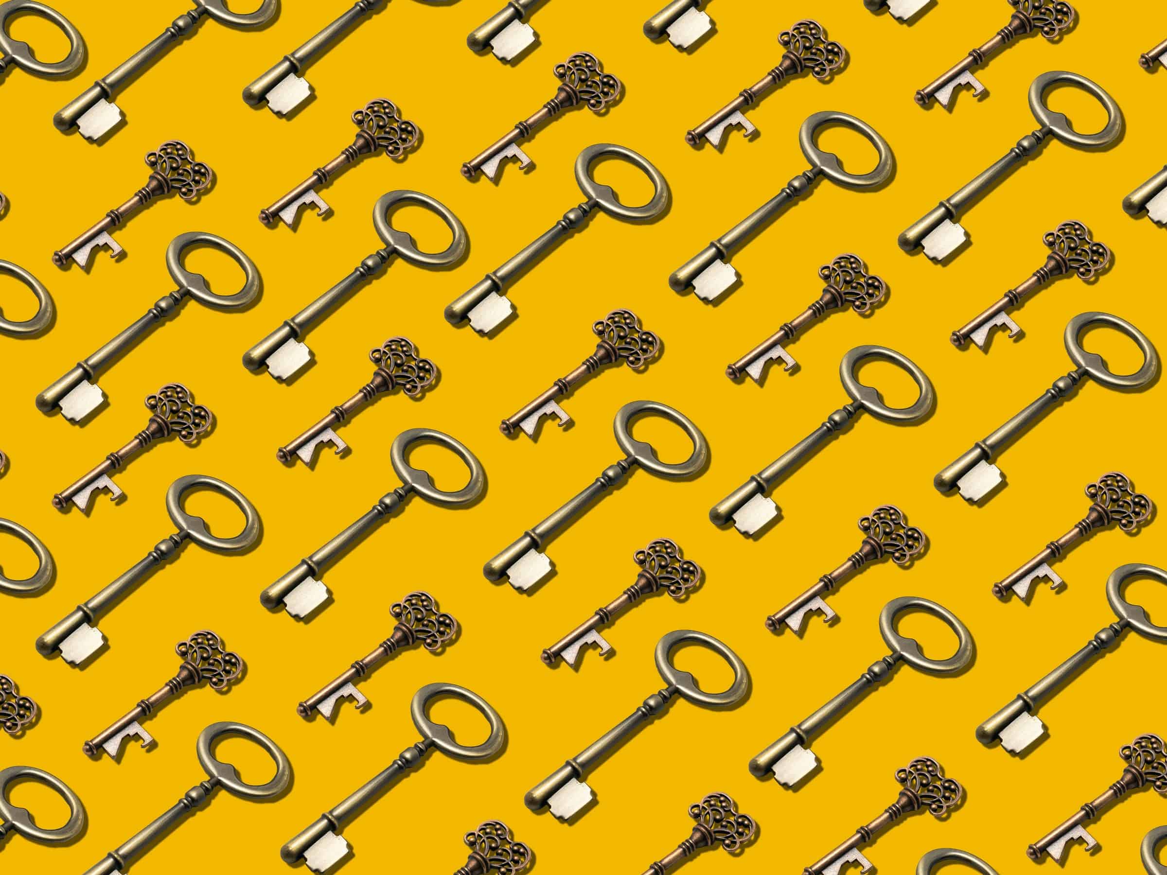 repeated pattern of keys on yellow background for strengthening customer communications article