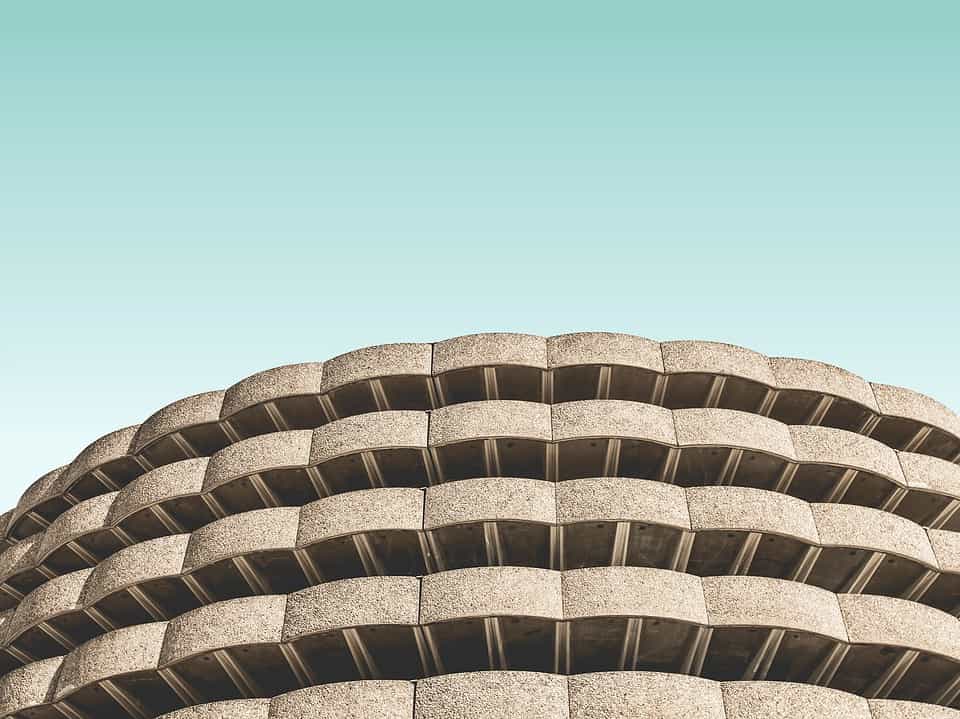 low angle photo of a brown concrete building for segmenting customers article