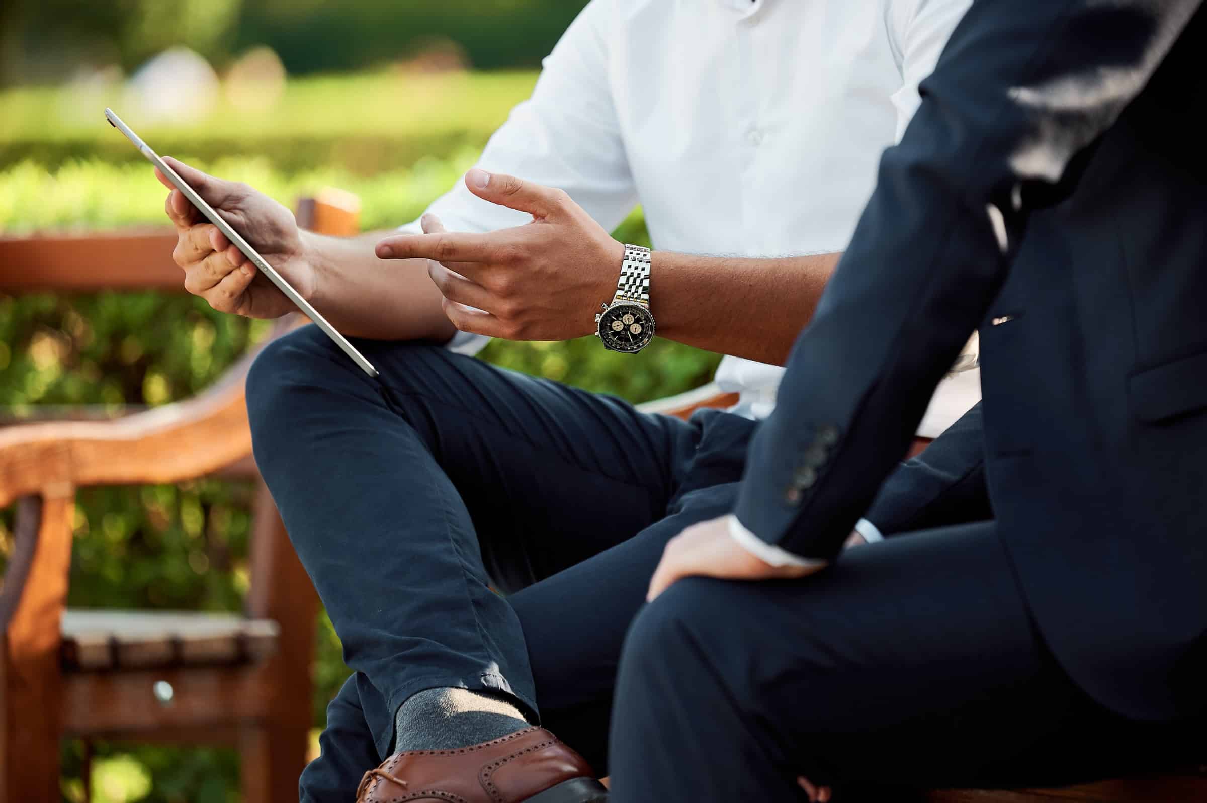 two business people discussing a deal in a park for lost customer article